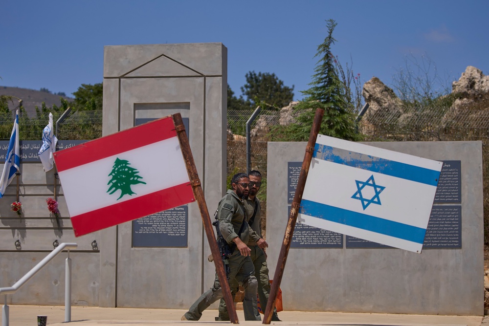 Israeli soldiers are seen at a memorial site on the border with Lebanon in northern Israel, Sunday, 28 June 2026 (AP)
