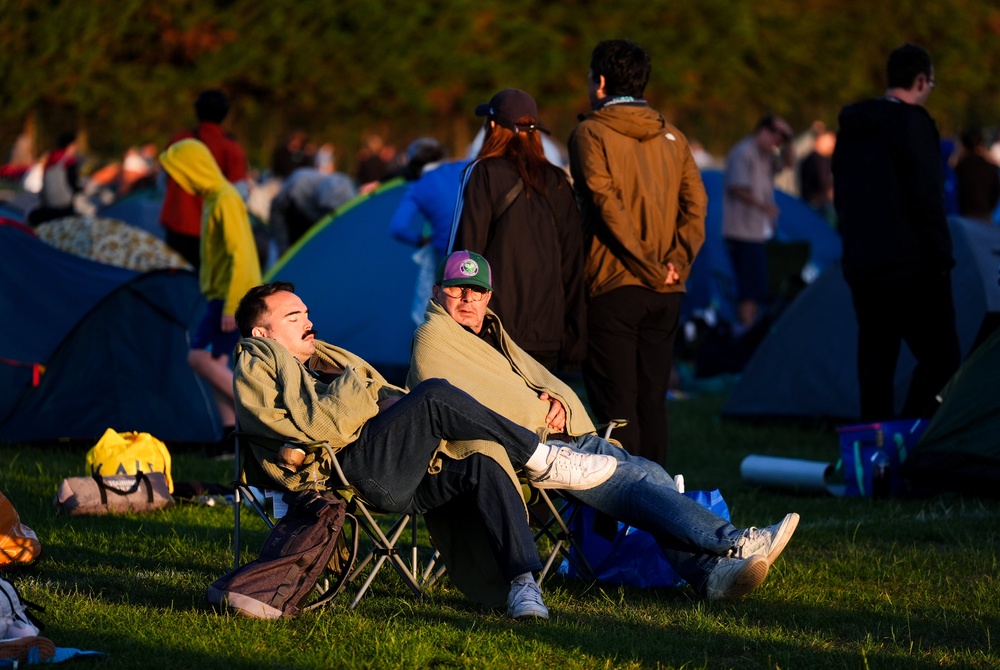 Many people camped overnight in tents or arrived in the early hours of Monday morning (Mike Egerton/PA) (PA Wire)