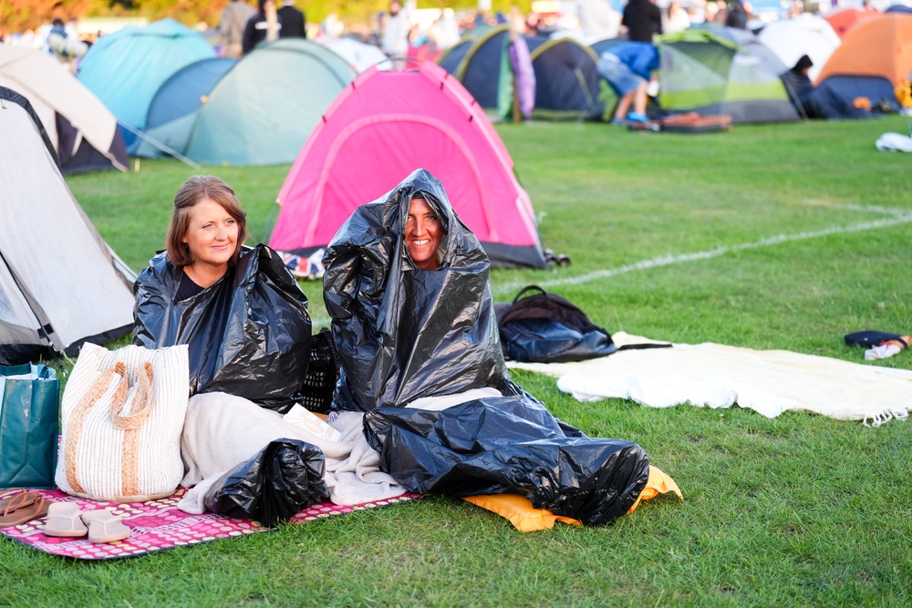 The park was filled with people relaxing on picnic blankets (Mike Egerton/PA) (PA Wire)