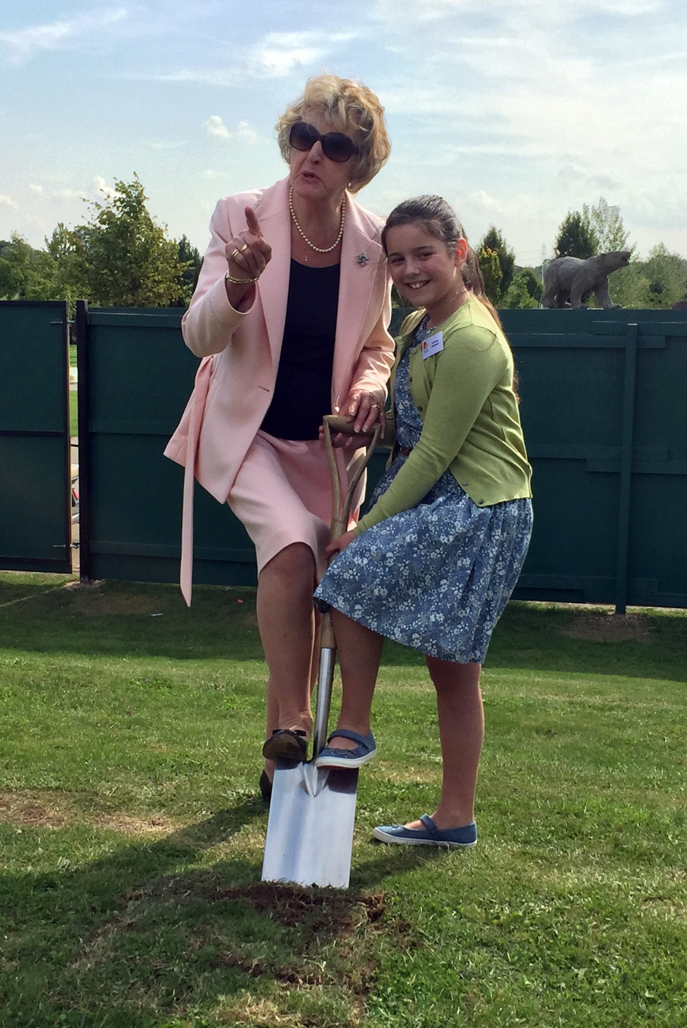 As a patron of the National Memorial Arboretum, Dame Penelope posed with 10-year-old sea cadet Beth Molyneux, whose father was killed aboard submarine HMS Astute in 2011, dig a ceremonial spade of earth on the site of a new Remembrance Centre in 2015 (PA) (PA Media)