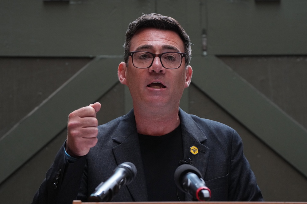 Andy Burnham delivers a speech at the People's History Museum in Manchester (AP)