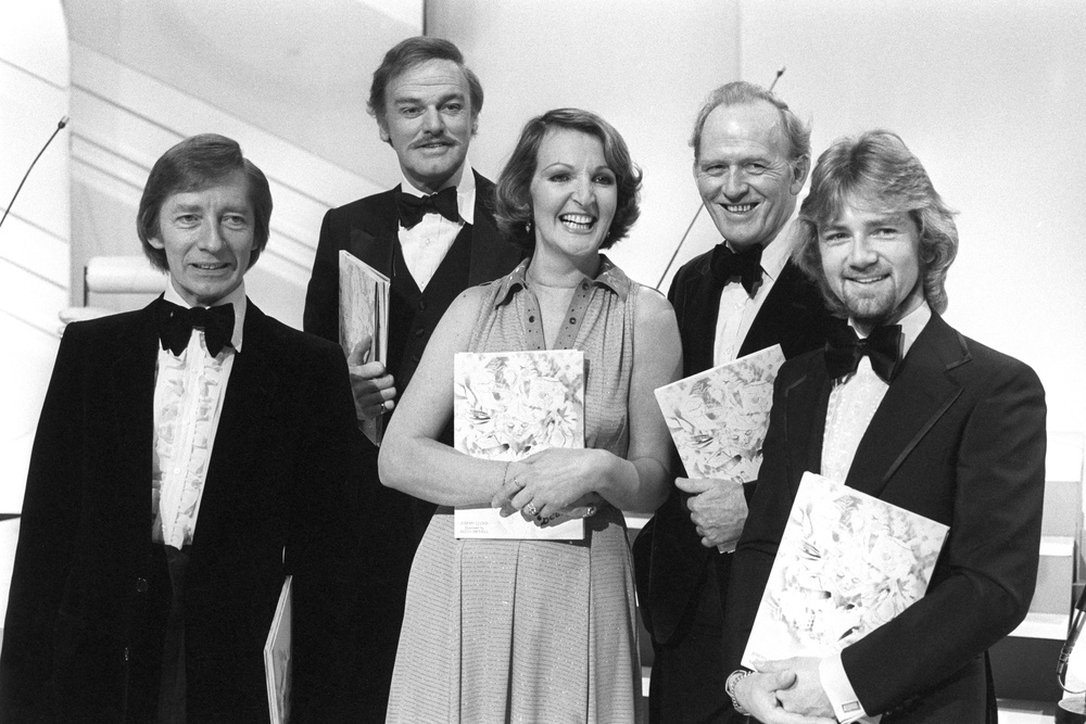 During filming for Captain Beaky And His Band for the BBC with Keith Michell (second left), who made the single Captain Beaky, Penelope Keith and Gordon Jackson (second right), who will star in the TV special. With them are author Jeremy Lloyd and radio DJ Noel Edmonds (right), who helped the single become a hit by playing the record on his Sunday morning show (PA) (PA Archive)