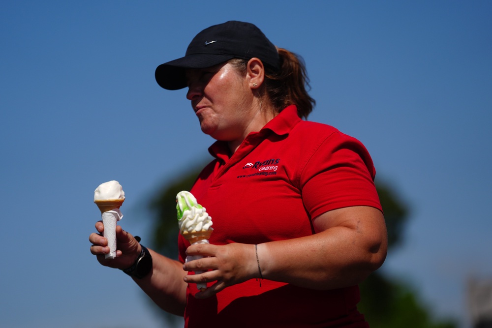 A member of staff carries ice cream cones during hot weather at the Curragh Racecourse in Curragh in County Kildare (Brian Lawless/PA) (PA Wire)