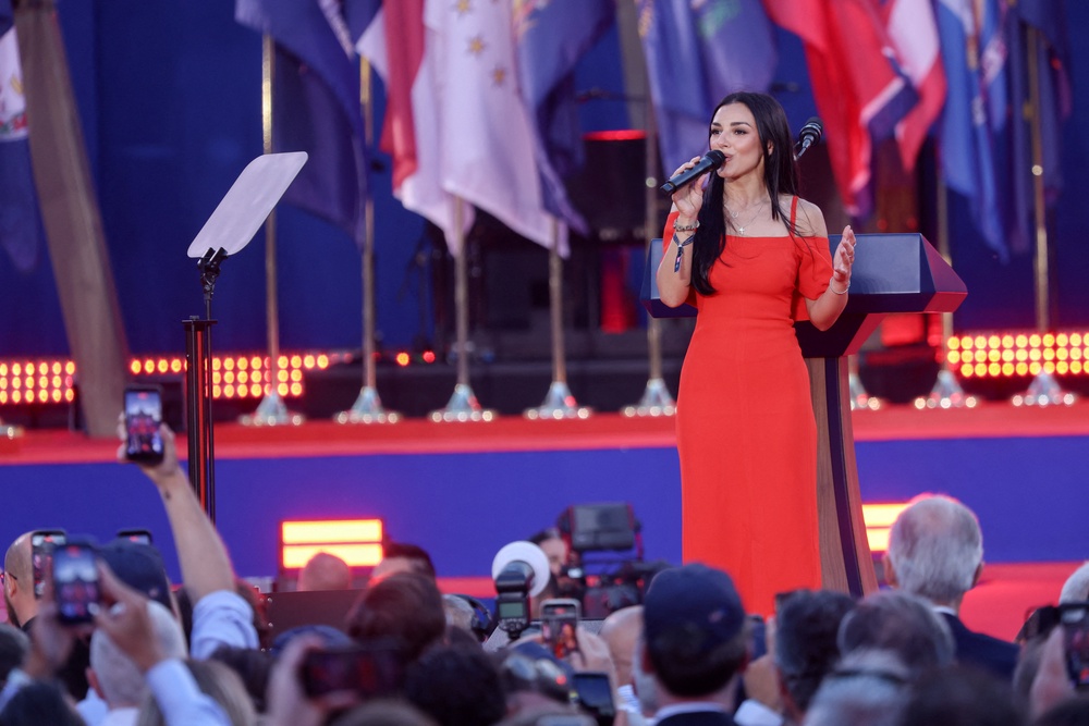 After the on-stage glitch, Wilkins was invited to sing the national anthem again. This time, it appeared to go off without a hitch (Reuters)