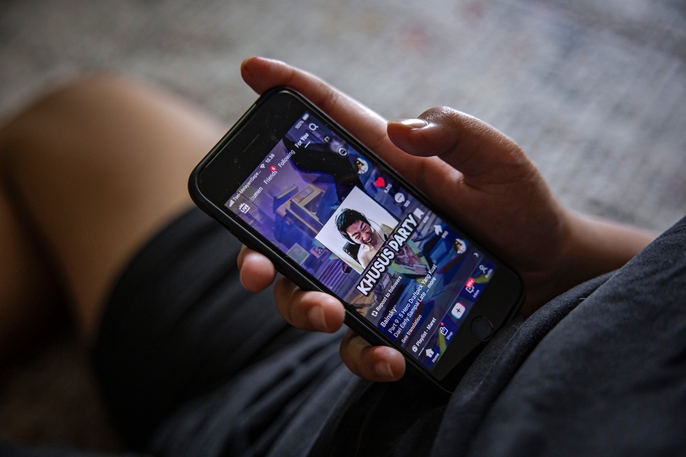 A 12-year-old boy watches TikTok on his smartphone (Getty Images)