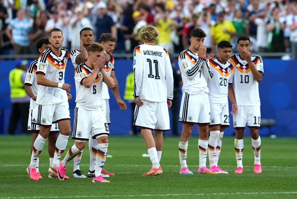 Germany appear dejected after Jonathan Tah misses a penalty (PA)