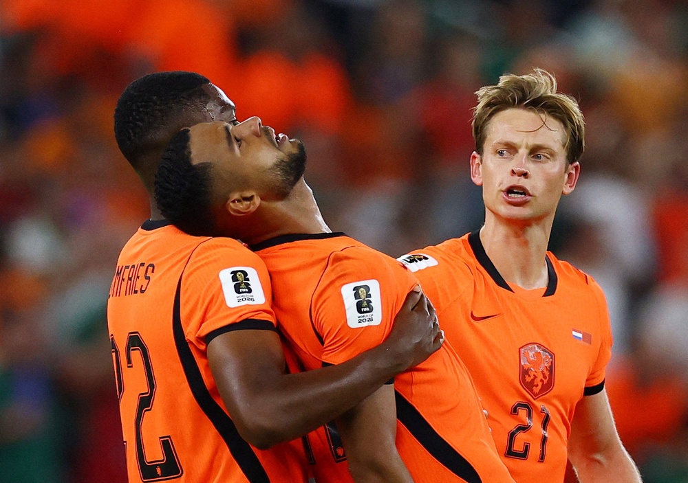 Gakpo was consoled by his teammates (Reuters)