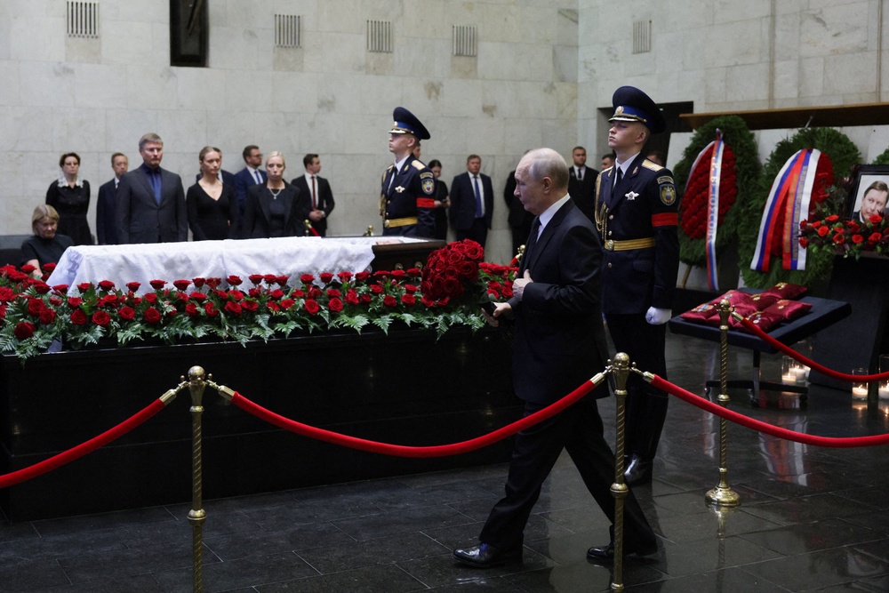 Russia's President Vladimir Putin pays his last respects to the late former defence minister Sergei Ivanov during a farewell ceremony in Moscow on June 30 (AFP/Getty)