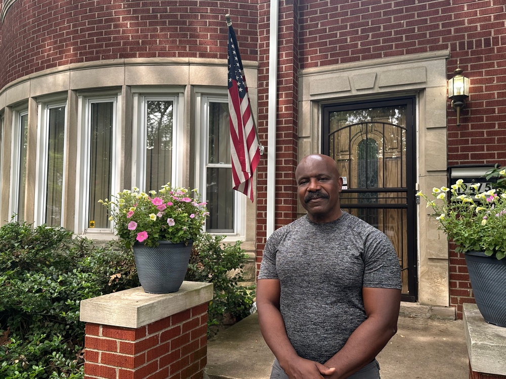Jerry Esters stands in front of American flag outside his Detroit home on June 9 (Copyright 2025 The Associated Press. All rights reserved)