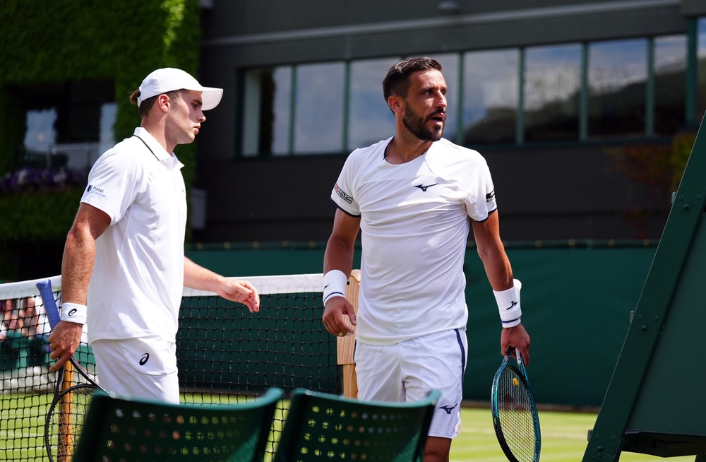 Damir Dzumhur argues with the match umpire during his match against Arthur Fery (PA)