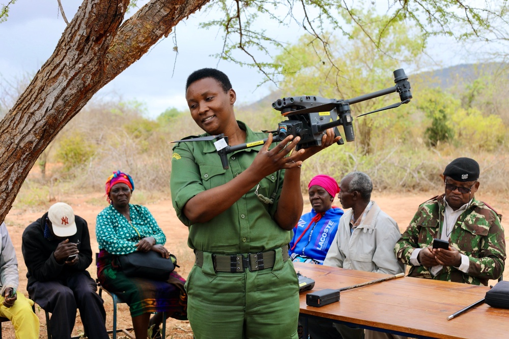 A ranger using a Team Owl Drone to monitor wildlife and spot illegal activity in Kenya (Wildlife Works)