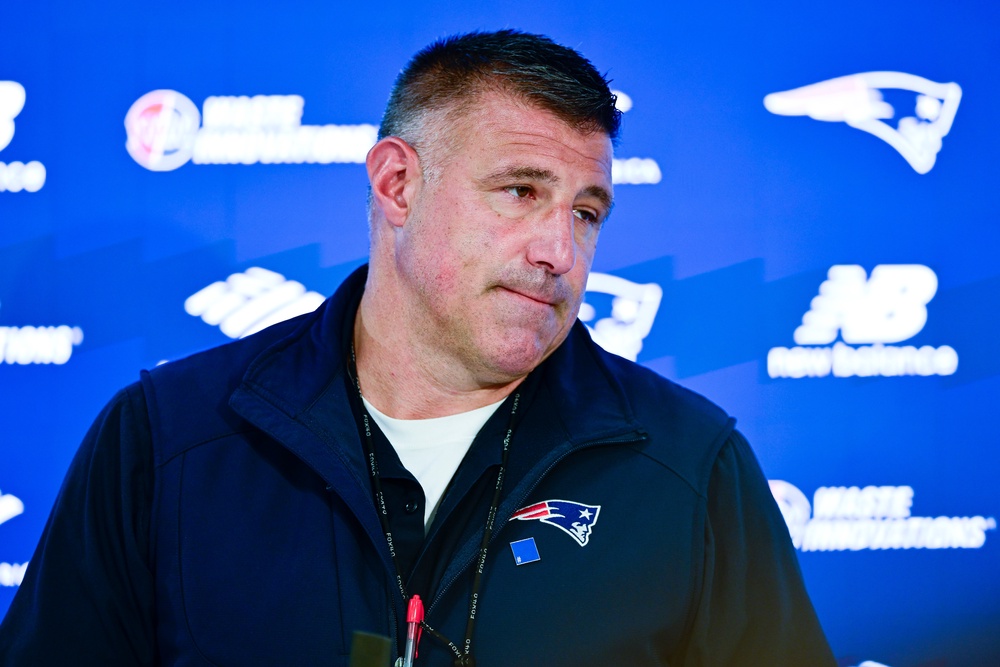 Russini was photographed hugging and holding hands with Patriots coach Mike Vrabel, causing a media frenzy (Getty)
