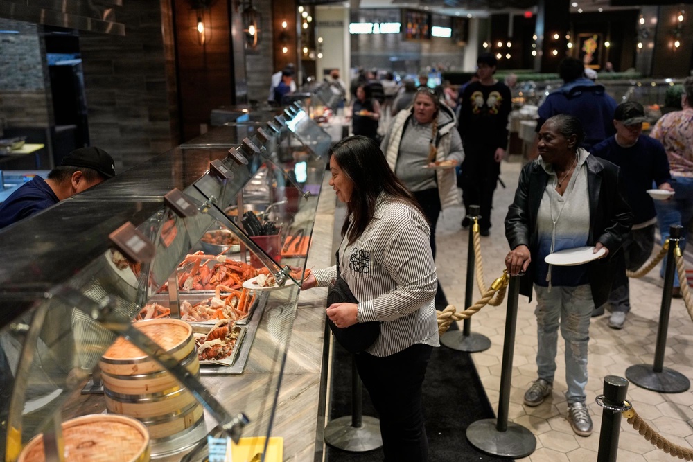 As the all-you-can-eat buffet became a hit, its origin story was disputed (AP Photo/John Locher)