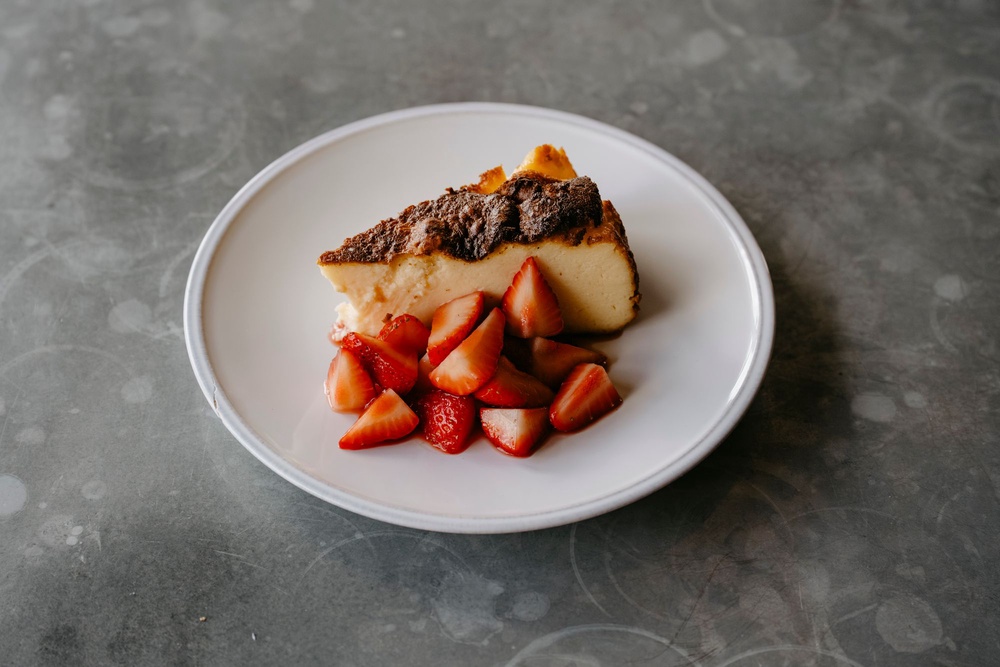 San Sebastián by way of Kent: Pack’s goat’s curd cheesecake and strawberry syrup (Chapel Down)