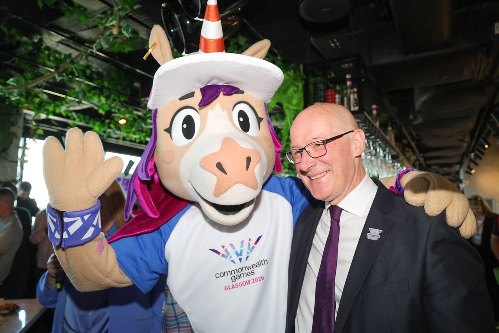First Minister John Swinney with Finnie, the Commonwealth Games’ mascot. (Steve Welsh/PA)