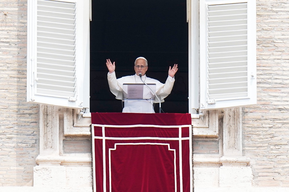 Pope Leo XIV waves during the Angelus noon prayer from the window of his studio overlooking St.Peter's Square, at the Vatican, Monday, June 29, 2026. (AP Photo/Alessandra Tarantino) (Copyright 2026 The Associated Press. All rights reserved)