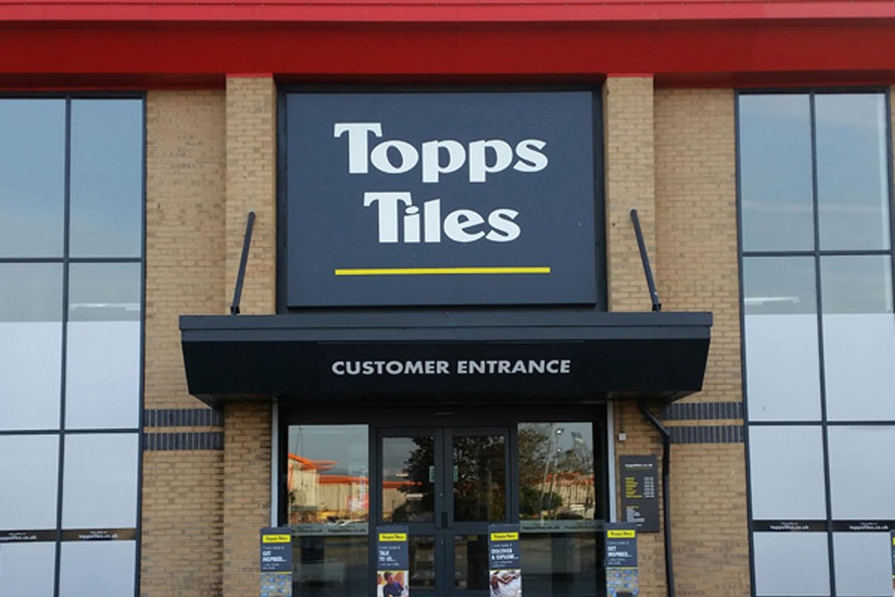 Topps Tiles said soaring temperatures led to traders pausing work (PA Media)