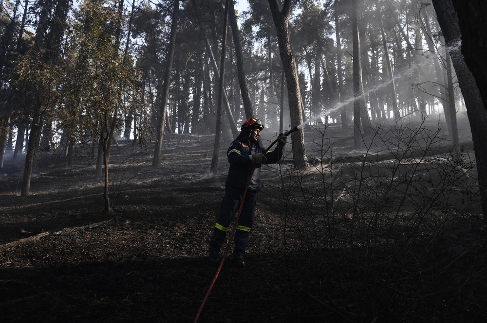 A firefighter near the blaze north of Thessaloniki on June 30, 2026. (AFP/Getty)