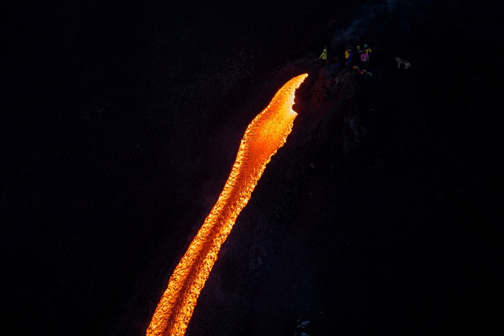 Orange lava spewed from a fissure about 3,000 metres above sea level (Reuters)