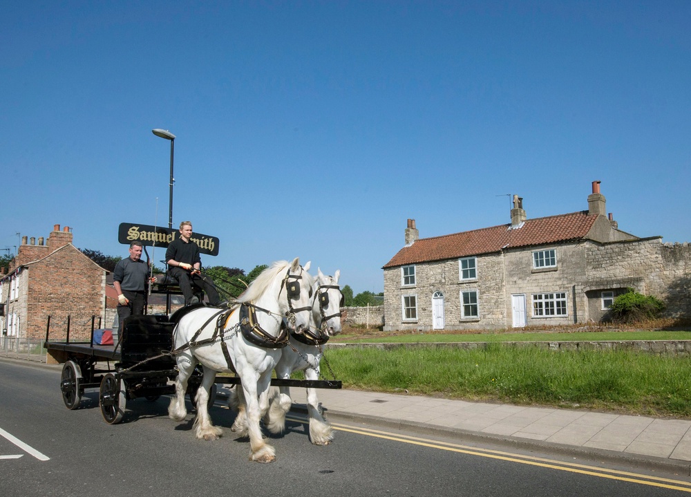 Horse drawn beer deliveries are still a familiar sight in Tadcaster (Danny Lawson/PA) (PA Archive)