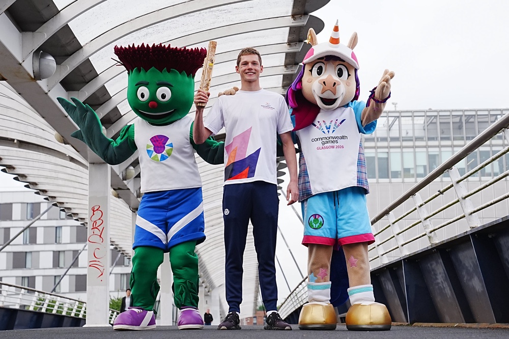 Duncan Scott was joined by Team Scotland mascot Clyde, left, and 2026 Commonwealth Games mascot Finnie to launch the relay (Jane Barlow/PA) (PA Wire)