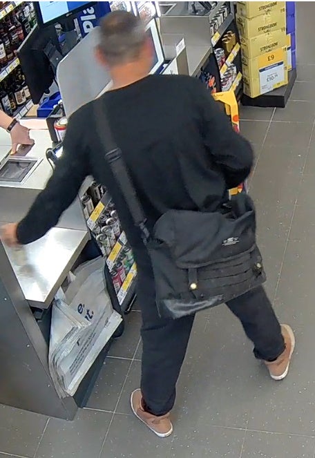 Police officers are asking for help to find a number of his missing personal belongings including a black satchel-style bag shown on the new CCTV images of Mr Hockey taken at Tesco Express in Truro on 22 June (Devon and Cornwall Police/PA Wire)