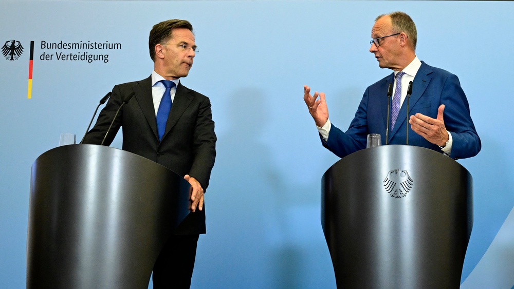 Nato secretary general Mark Rutte and German Chancellor Friedrich Merz address a press conference during their meeting on July 1 (AFP/Getty)