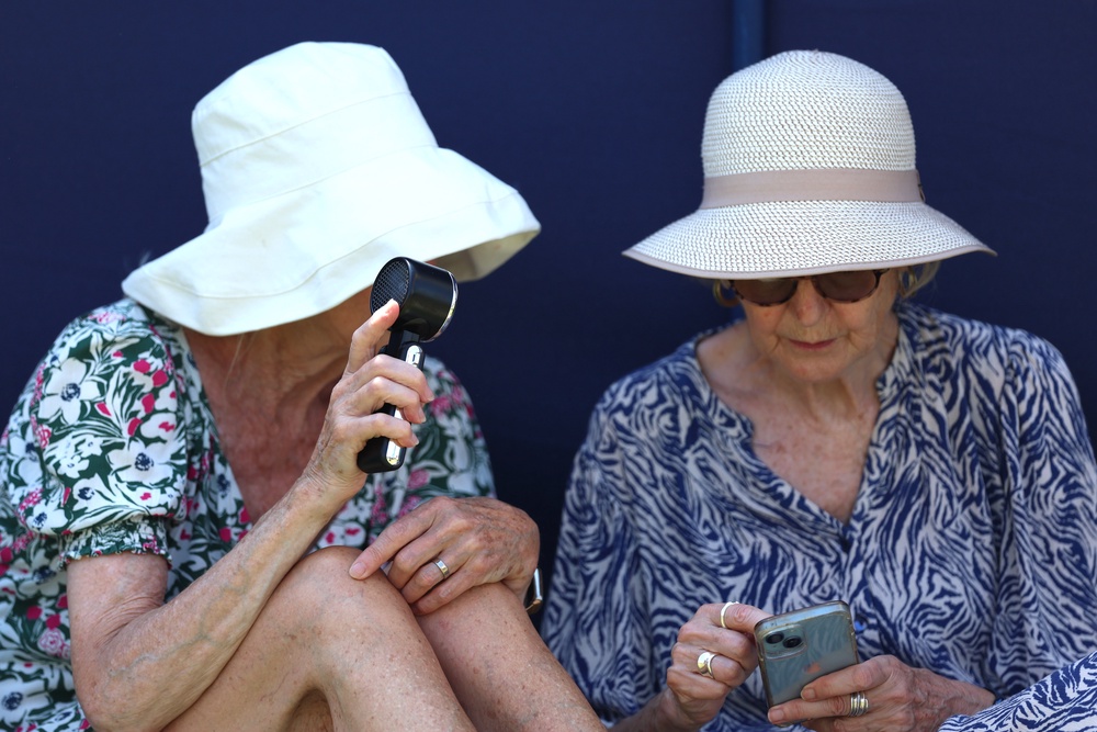 Spectators try to keep cool at the Eastbourne Open in East Sussex (Steven Paston/PA) (PA Wire)