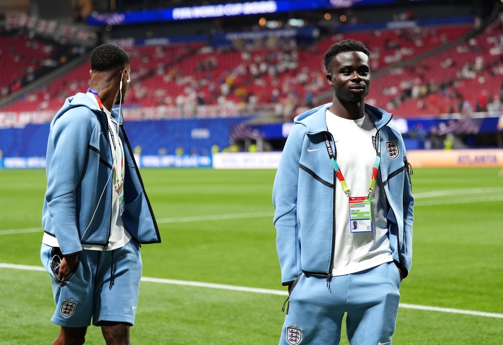 Bukayo Saka (right) has been benched (PA)