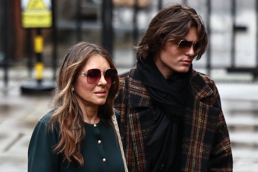 Elizabeth Hurley and son Damian arriving at the High Court (AFP/Getty)