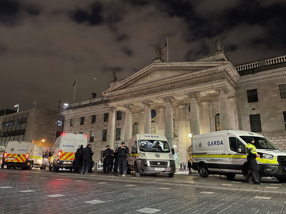 Garda outside the General Post Office on O’Connell Street in Dublin following violent scenes in the city centre (PA) (PA Archive)