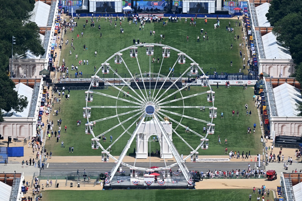 The Ferris wheel stands before a largely barren strip of Mall at 