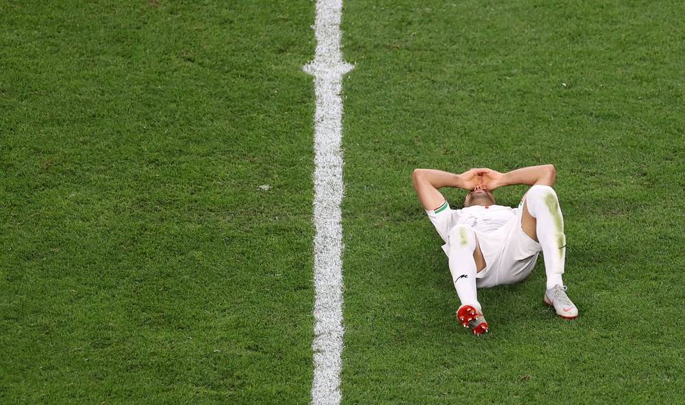 Shoja Khalilzadeh of Iran reacts after his June 26 winning goal against Egypt was voided for an offside violation. An Iranian political scientist once accused of working covertly for the Iranian government and later pardoned by Joe Biden, is now suing FIFA over the loss (Getty Images)