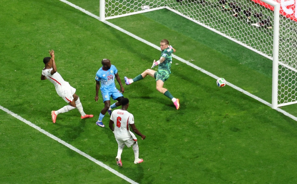 Yoane Wissa inexplicably hit the post from close range (Reuters)