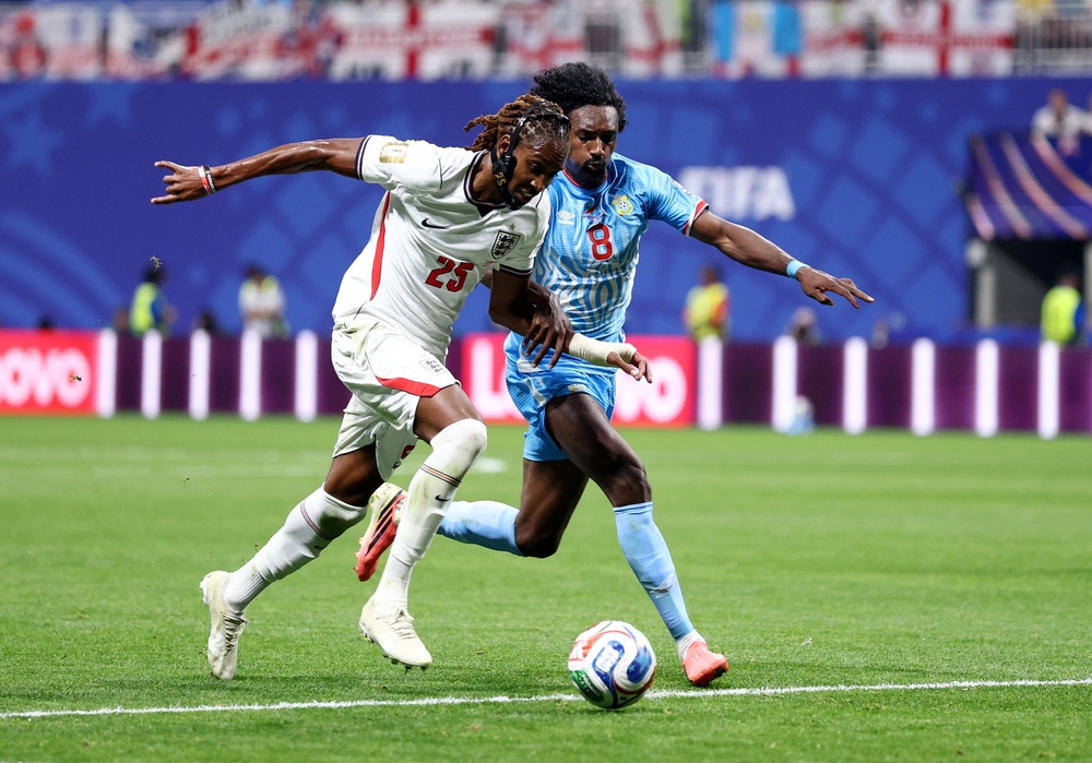Djed Spence #25 of England controls the ball against Samuel Moutoussamy (Getty)
