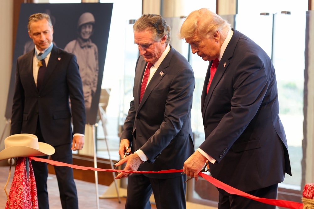 Interior Secretary Doug Burgum and Trump cut the ribbon to open the Theodore Roosevelt Presidential Library (Getty Images for Theodore Roosevelt Presidential Library)