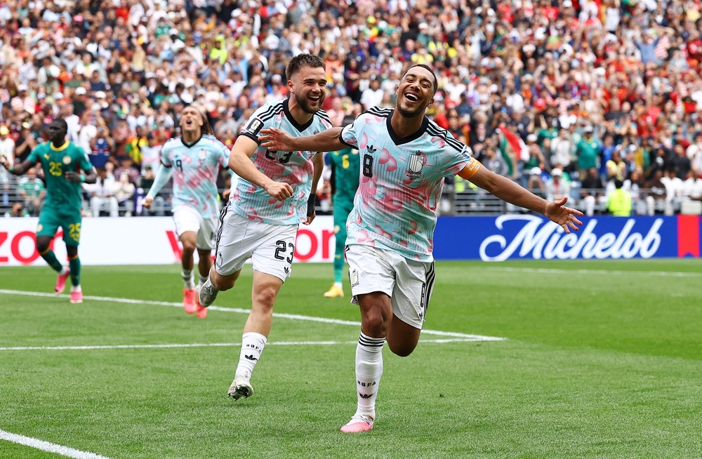 Youri Tielemans equalised late on and then scored a last-gasp extra-time penalty to see Belgium through (Reuters)