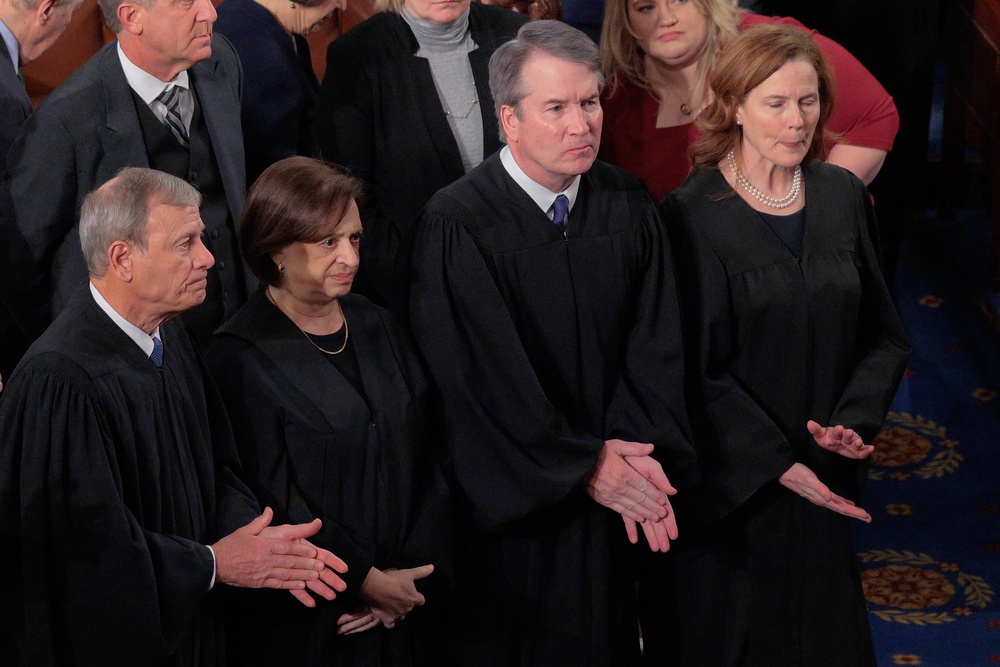 Supreme Court Chief Justice John Roberts and Associate Justices Elena Kagan, Brett Kavanaugh and Amy Coney Barrett applaud at the conclusion of President Donald Trump's State of the Union address (Getty)