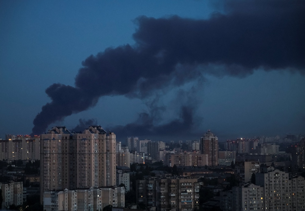 Buildings in Kyiv seen on fire as smoke billows from residential area (Reuters)