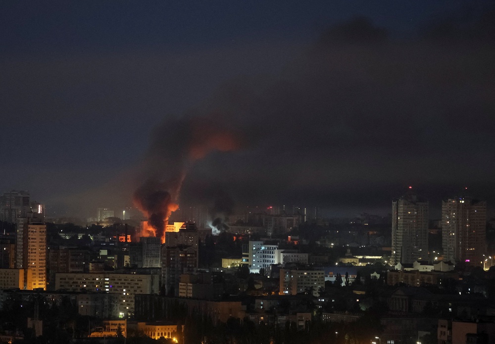 Smoke rises in the city during a Russian missile and drone strike in Kyiv (Reuters)