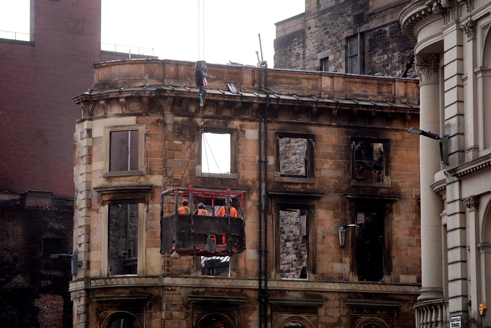 The facade of the building was demolished after the fire destroyed the rest of the structure (Andrew Milligan/PA) (PA Wire)