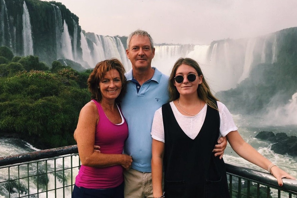 Emily Oliver, who died from DIGP, with her parents Debi and Tim (Family handout)