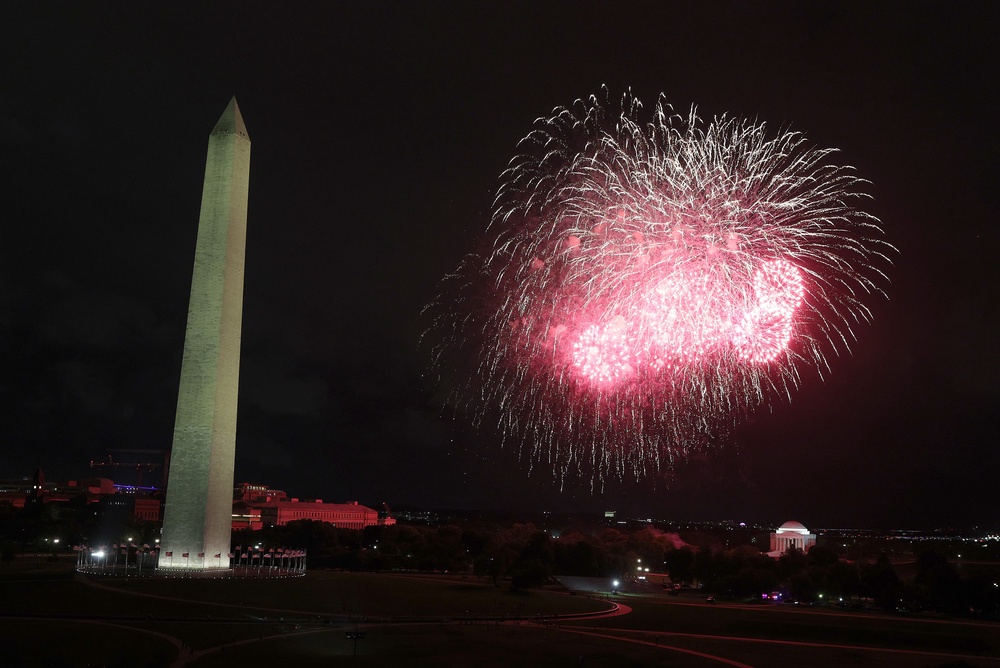 Fireworks explode in the air over the National Mall at the conclusion of UFC Freedom 250 at the White House in June (Getty)