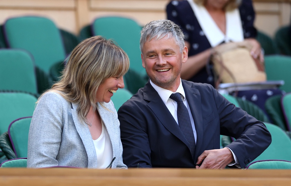 Musician Tom Chaplin and partner Nat Dive are seen in the royal box on day four of The Championships Wimbledon 2026 (Getty)