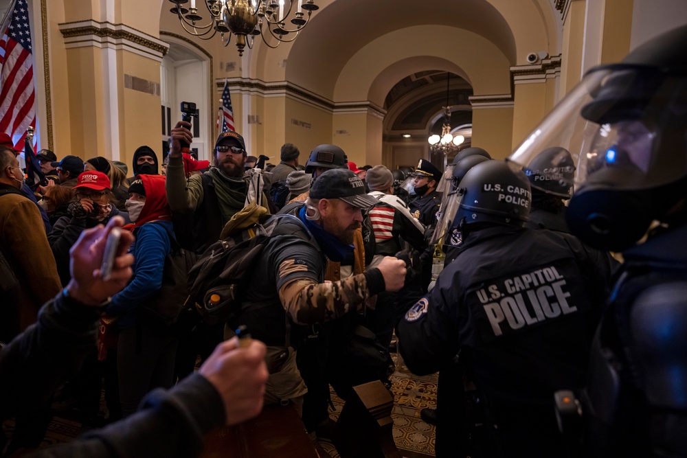Scenes from the January 6 attack. More than a third of Americans believe that violence may be necessary to 'right the ship' (Getty)