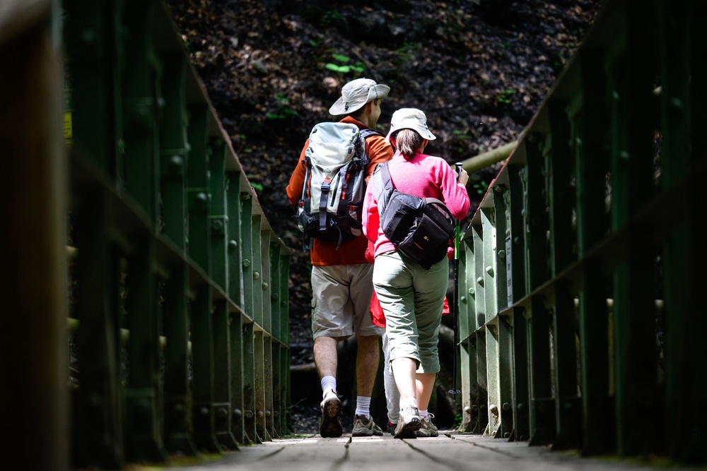Hikers cross a bridge in the Bavarian Alps in June 2015 near Garmisch-Partenkirchen, Germany. Adventurous types should pack blister pads (Getty Images)