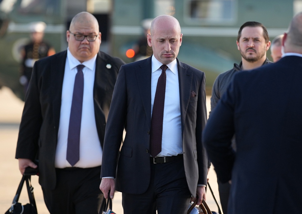 White House Communications Director Steven Cheung (left) and Deputy Chief of Staff Stephen Miller (right) each drew salaries of $195,200, according to the report (Getty)