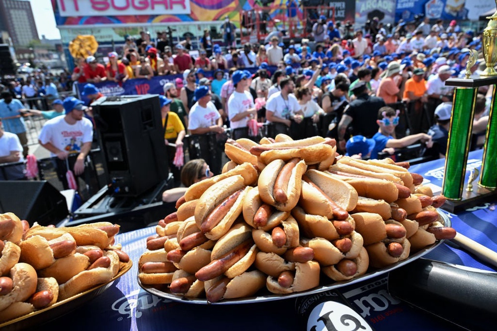 The famous Fourth of July hot dog eating contest in New York tied them to the nation's birthday (Getty Images)