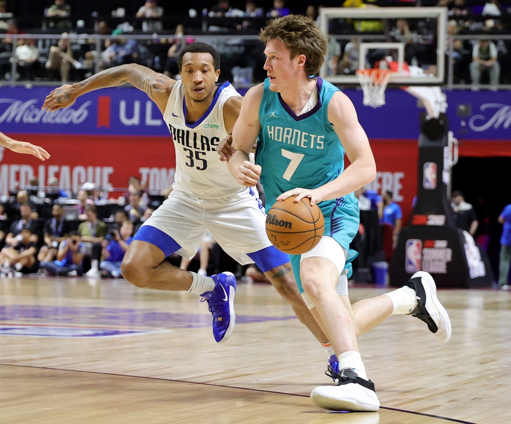 Kon Knueppel #7 of the Charlotte Hornets drives against Matthew Cleveland #35 of the Dallas Mavericks in the first half of a 2025 NBA Summer League game at the Thomas & Mack Center on July 14, 2025 in Las Vegas, Nevada (Getty Images)