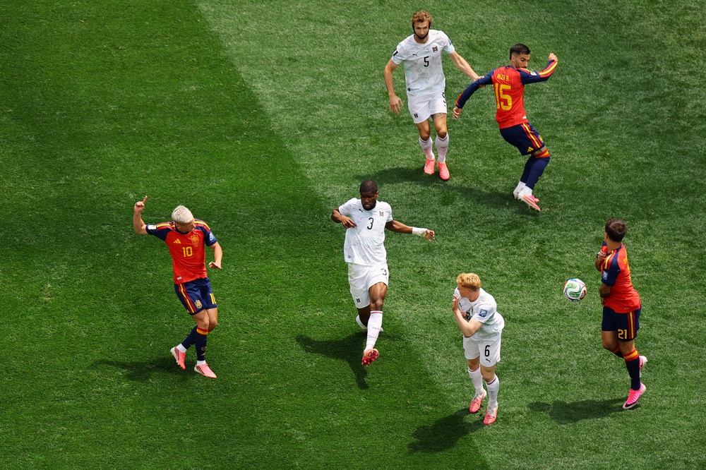 Olmo’s shot is blocked by teammate Oyarzabal (Reuters)